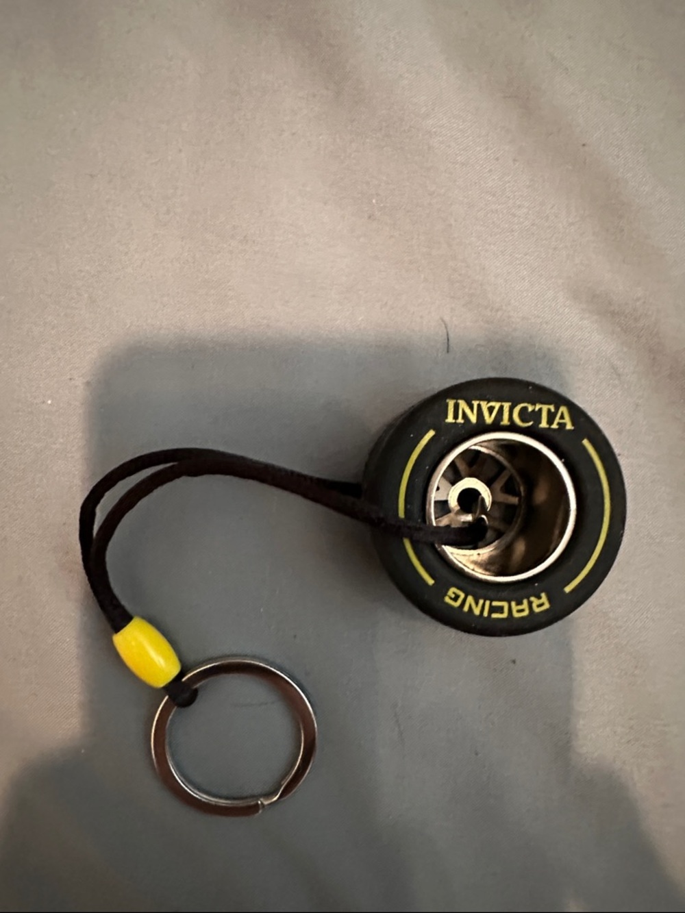 Invicta Racing F1 Rubber Tire keychain
